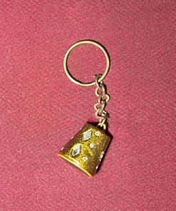 Golden lacquer bell keychain with mirror work